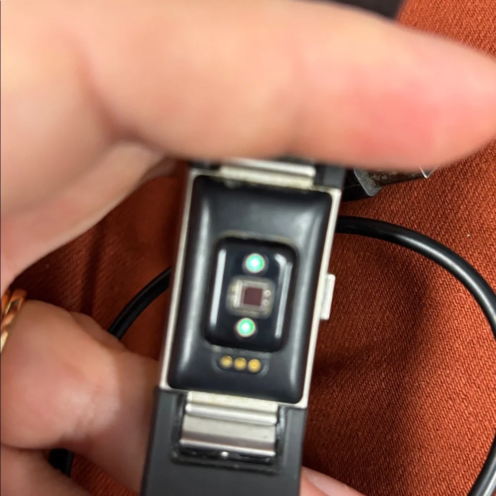 Black Fitbit Charge 2 with Charger